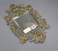 A Victorian brass mirror H.42cm x W25cm
