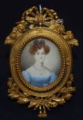 Victorian School, oil on ivory, Miniature portrait of a lady in blue dress in ornate ormolu frame