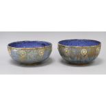 A pair of Royal Doulton blue mottled ground bowls, shape 4737, assistant's mark EB