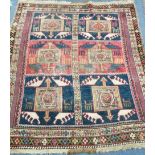 A Turkish red and blue rug 130 x 136cm