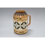 A Doulton Lambeth motto beer jug, c.1895, inscribed 'BITTER MUST BE THE CUP...', H. 18cm