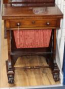 An early Victorian rosewood folding games / work table W.54cm