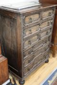 A Jacobean style oak chest, fitted six long drawers W.77cm