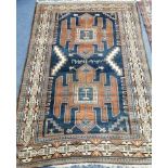 A Persian blue ground rug 125 x 185cm