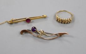 A 9ct gold ring and two 9ct and gem set bar brooches.