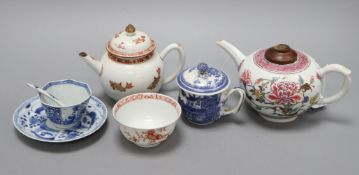 An 18th century Chinese export teapot, two tea bowls, custard cup another teapot Tallest teapot H.