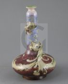 Mark V Marshall for Doulton lambeth, a flambe bottle vase entwined by a mythical beast, c.1885,