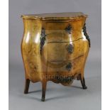 A late 19th century Dutch walnut and marquetry bombe commode, fitted three long drawers and inlaid