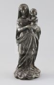 An early 19th century Italian bronze group of the Madonna and child, standing on a cloud base, H.