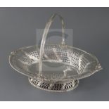 An early George III pierced silver oval bread basket, by Edward Aldridge, with engraved armorial and