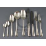 A 1970's canteen of Garrard & Co hanovarian rat tail pattern cutlery for twelve, comprising one