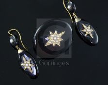 A suite of Victorian gold mounted black onyx and split pearl mourning jewellery, comprising a brooch