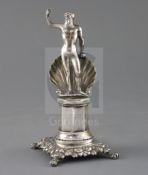 A 19th century Portuguese silver miniature model of Neptune? with shell (lacking trident), the