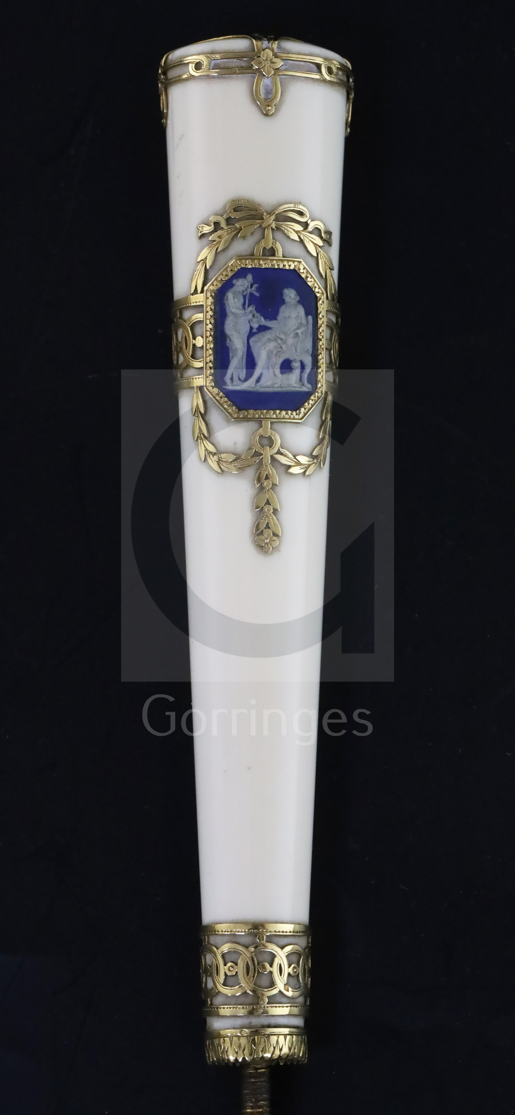 A Swiss gold-mounted ivory parasol handle, inset with a blue jasper plaque of classical figures