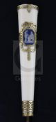 A Swiss gold-mounted ivory parasol handle, inset with a blue jasper plaque of classical figures