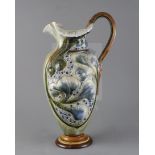 Mark V Marshall for Doulton Lambeth, a large organic-form jug with grotesque mask handle, c.1895,