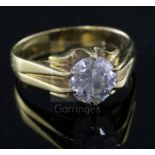 An 18ct gold claw set solitaire diamond ring, the round cut stone weighing approximately 2.10cts,
