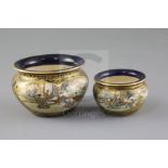 Two graduated Japanese Satsuma pottery bowls, by Kinkozan, Meiji period, each painted with figures