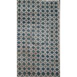 A Tibetan 'stepped cross' rug, c.1920, 5ft 2in. x 2ft 11in.