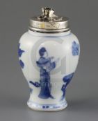 A Chinese blue and white baluster jar, Kangxi period, painted with two ladies in a rockwork