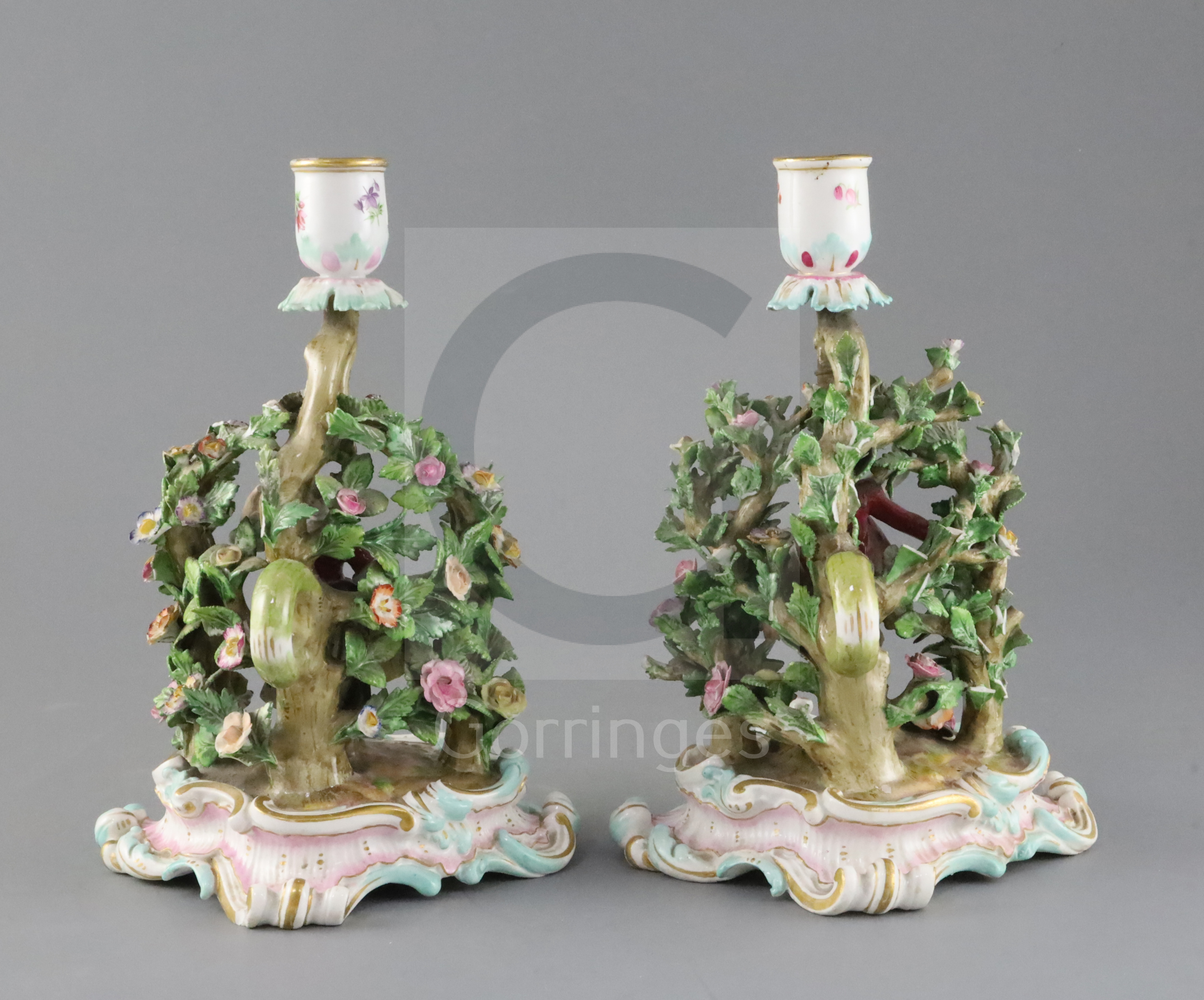 A pair of Meissen figural candlesticks, late 19th century, each modelled with a figure of either a - Image 2 of 3