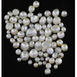 Seventy eight loose undrilled assorted shaped natural pearls, gross weight 52.58cts, with