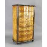 An early 20th century French rosewood and marquetry semanier, with serpentine front and block