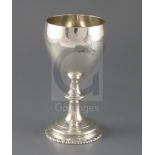 A George III silver pedestal goblet by, Aldridge & Green, with engraved crest, on gadrooned foot,