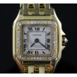 A lady's modern 18ct gold and diamond Cartier Panthere quartz wrist watch, with Roman dial and