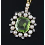 A late Victorian gold and silver, peridot, split pearl and diamond set pendant, in fitted gilt