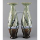 Eliza Simmance for Royal Doulton, a pair of tall Art Nouveau vases, c.1905, wrythen moulded and
