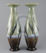 Eliza Simmance for Royal Doulton, a pair of tall Art Nouveau vases, c.1905, wrythen moulded and