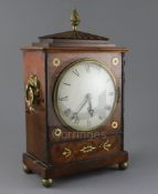 A Regency brass inset mahogany mantel timepiece, with painted Roman dial and single fusee eight