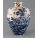 A Japanese Satsuma pottery ovoid 'dragon' vase, Meiji period, decorated with a striking dragon