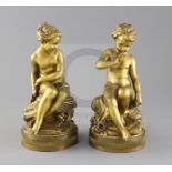 After Etienne-Maurice Falconet. A pair of late 19th century French ormolu figures of Cupid and