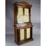 A Regency brass inset rosewood bookcase, with moulded pediment over two brass grille silk pleated