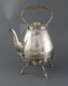 A Victorian silver tea kettle on stand with burner by Lambert & Co, of bulbous form, with engraved
