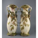 A pair of tall Royal Dux Art Nouveau two handled vases, early 20th century, each modelled with