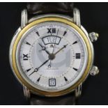 A gentleman's early 2000 steel and 18ct gold Maurice Lacroix automatic day/date alarm wrist watch,