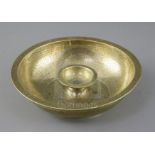 A large brass Persian magic bowl, Qajar dynasty, with inscribed decoration, Diam. 8.25in.
