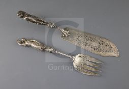 A pair of Victorian silver fish servers, with cast figural handles modelled as a fisherman and his