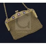 A French pierced 18ct gold, ruby, sapphire and diamond mesh evening purse, set with gem set floral