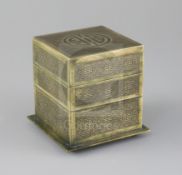 A Chinese bronze 'shou' three tier square box, 19th century, decorated with shou medallions and a