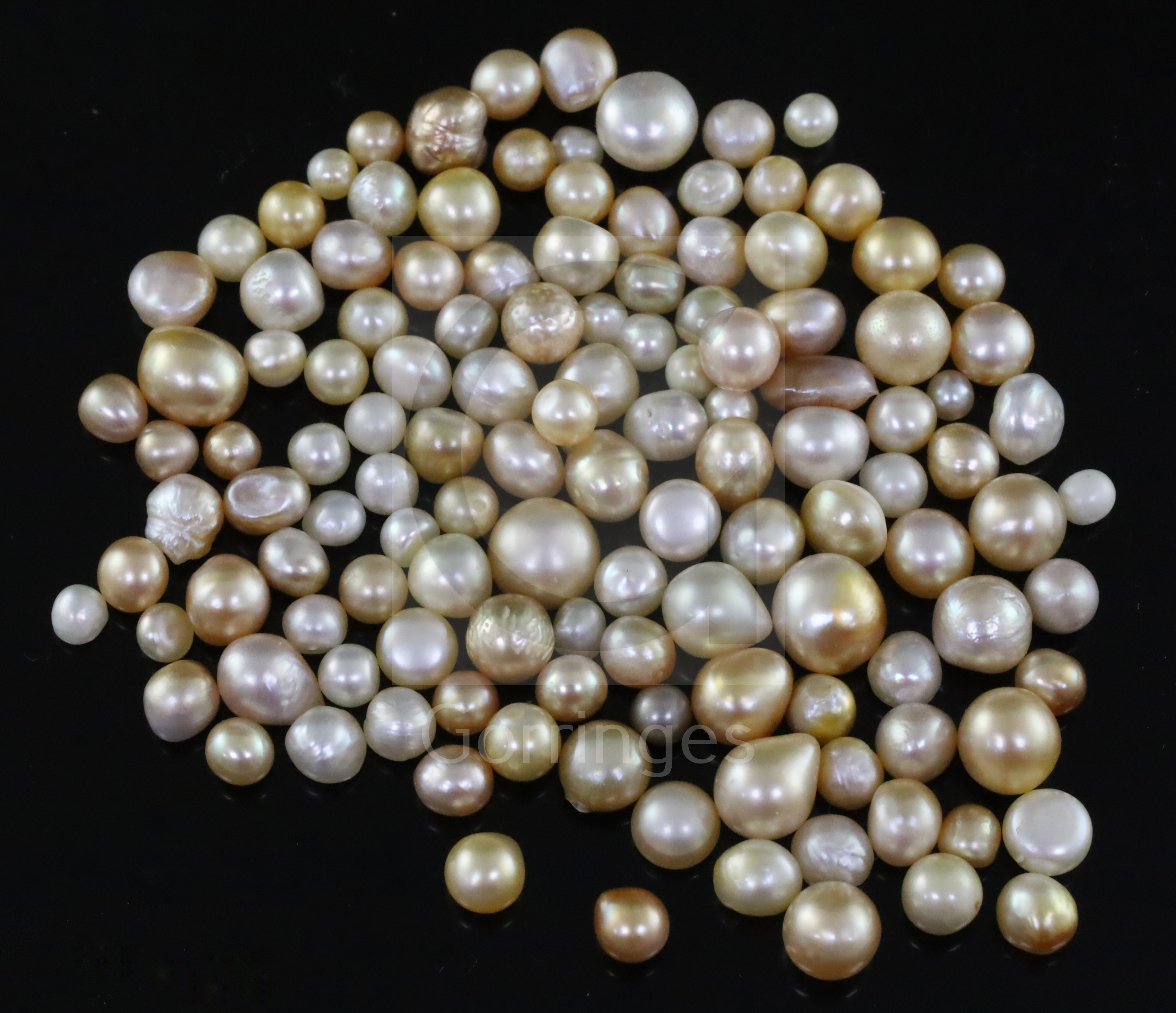 One hundred and twenty seven loose undrilled assorted shaped natural pearls, gross weight ,106.44ct,