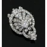 A Victorian gold, silver and old mine cut diamond set pendant brooch, of shaped oval form with
