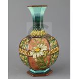 A Doulton Lambeth faience hexagonal baluster vase, c.1885, attributed to Mary Denley, painted with