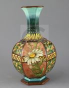 A Doulton Lambeth faience hexagonal baluster vase, c.1885, attributed to Mary Denley, painted with