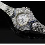 A lady's 14k white gold, sapphire and diamond set manual wind cocktail watch, with Arabic dial