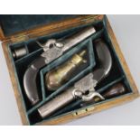 A pair of early 19th century box percussion lock pocket pistols, with scrolling engraved decoration,