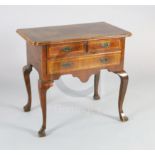 An early 18th century walnut lowboy, with crossbanded quarter veneered top, two short and one long